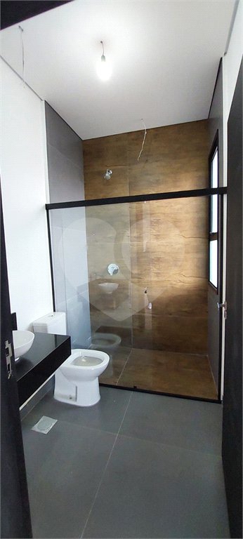Casa à venda com 4 suítes no condomínio Figueira Garden, Atibaia - SP