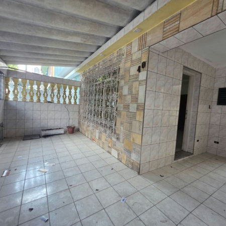 Sobrado com 3 dormitórios à venda, 129 m² por R$ 638.000,00 - Encruzilhada - Santos/SP