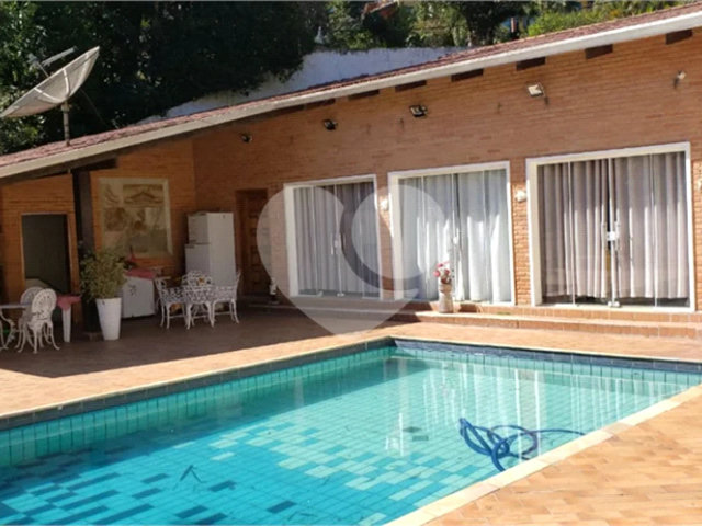 Casa à venda com 4 suítes no condomínio Alpes da Cantareira, Mairiporã - SP