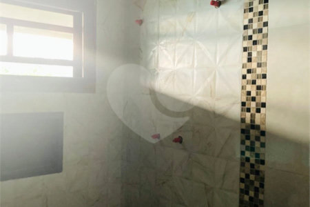 Casa à venda com 3 suítes no condomínio Lagoinha, Jacareí - SP