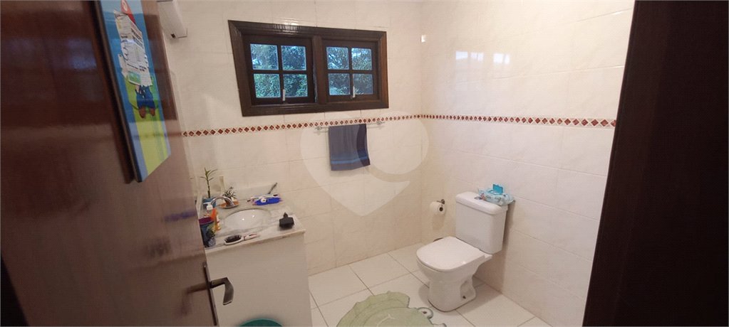 Casa à venda com 4 suítes no condomínio Alpes da Cantareira, Mairiporã - SP