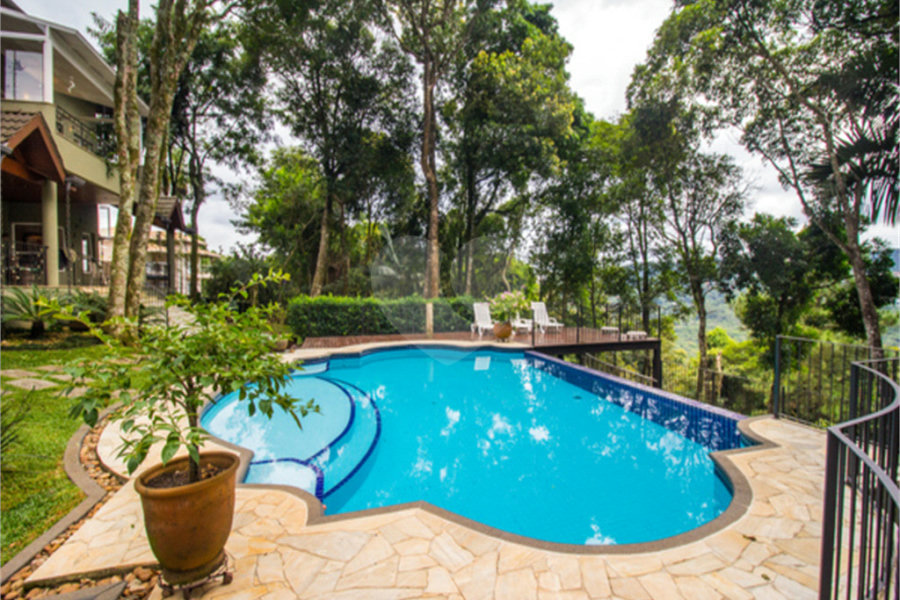 Casa à venda com 4 suítes no condomínio Alpes da Cantareira, Mairiporã - SP