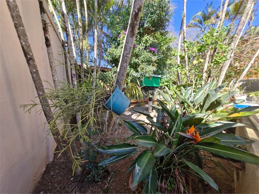 Casa à venda com 4 suítes no condomínio Villa Viana II, Cotia - SP