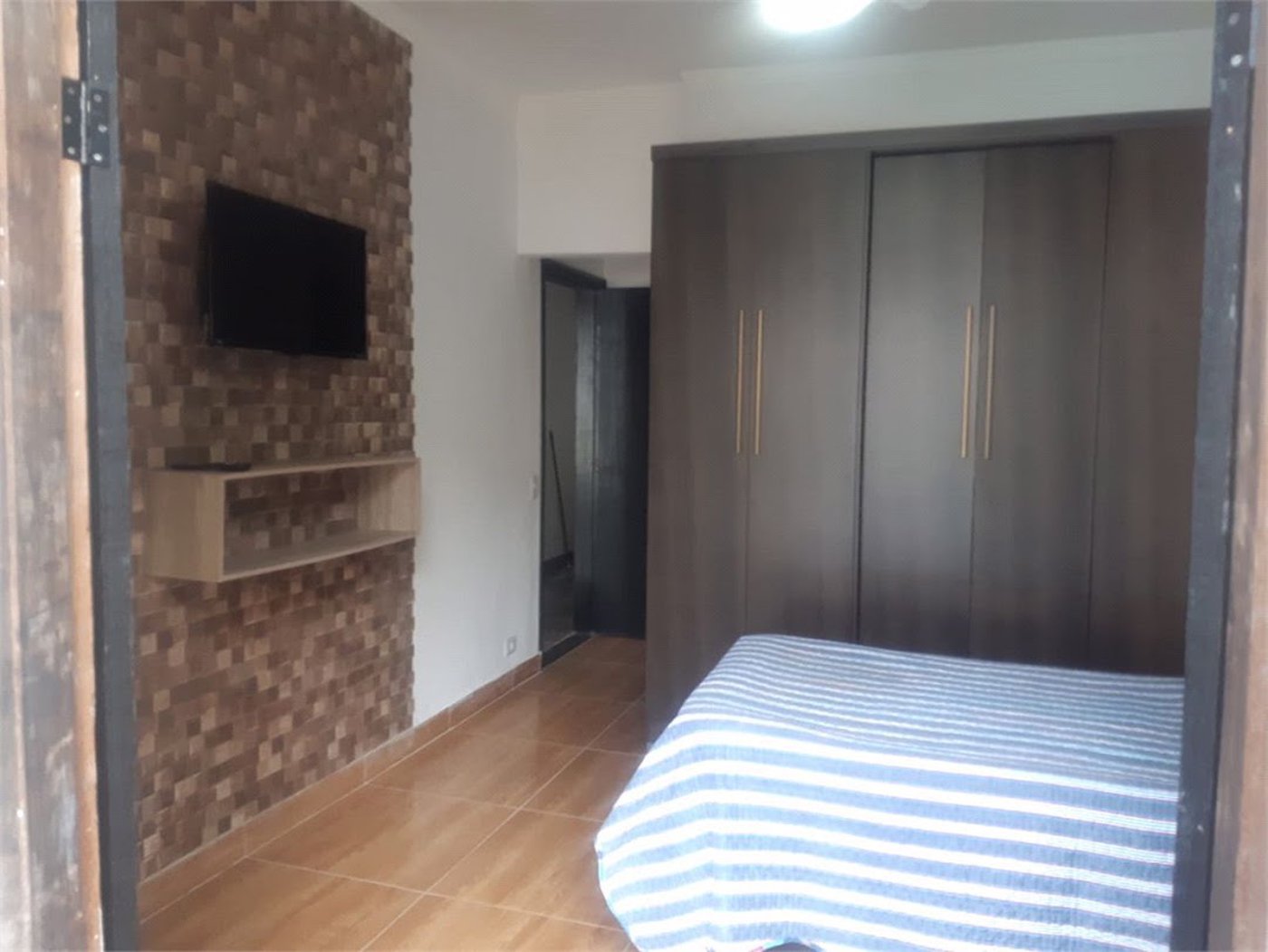 Casa com 4 dormitórios à venda, 180 m² por R$ 650.000,00 - Jardim Virginia - Guarujá/SP