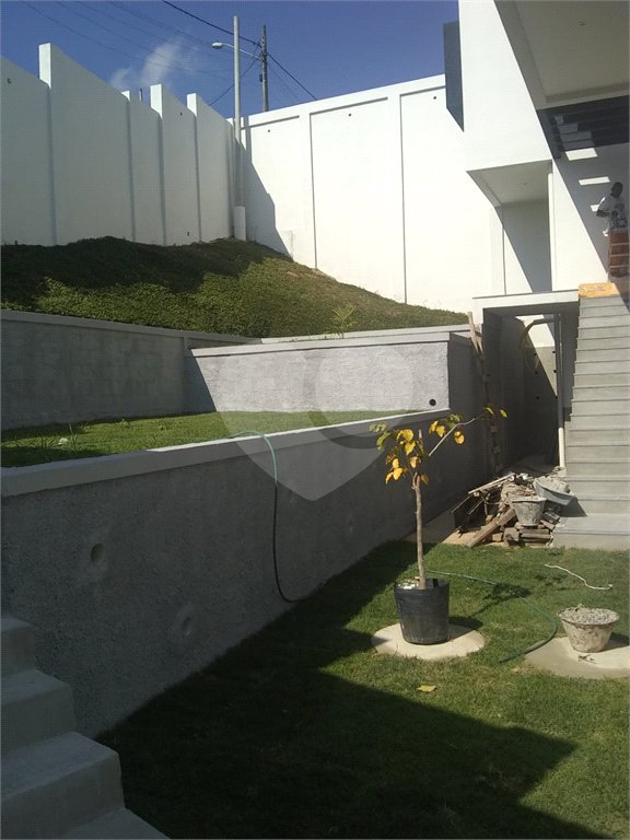 Casa à venda com 4 quartos, sendo 2 suítes, no condomínio Residencial Green Ville, Rio de Janeiro - RJ