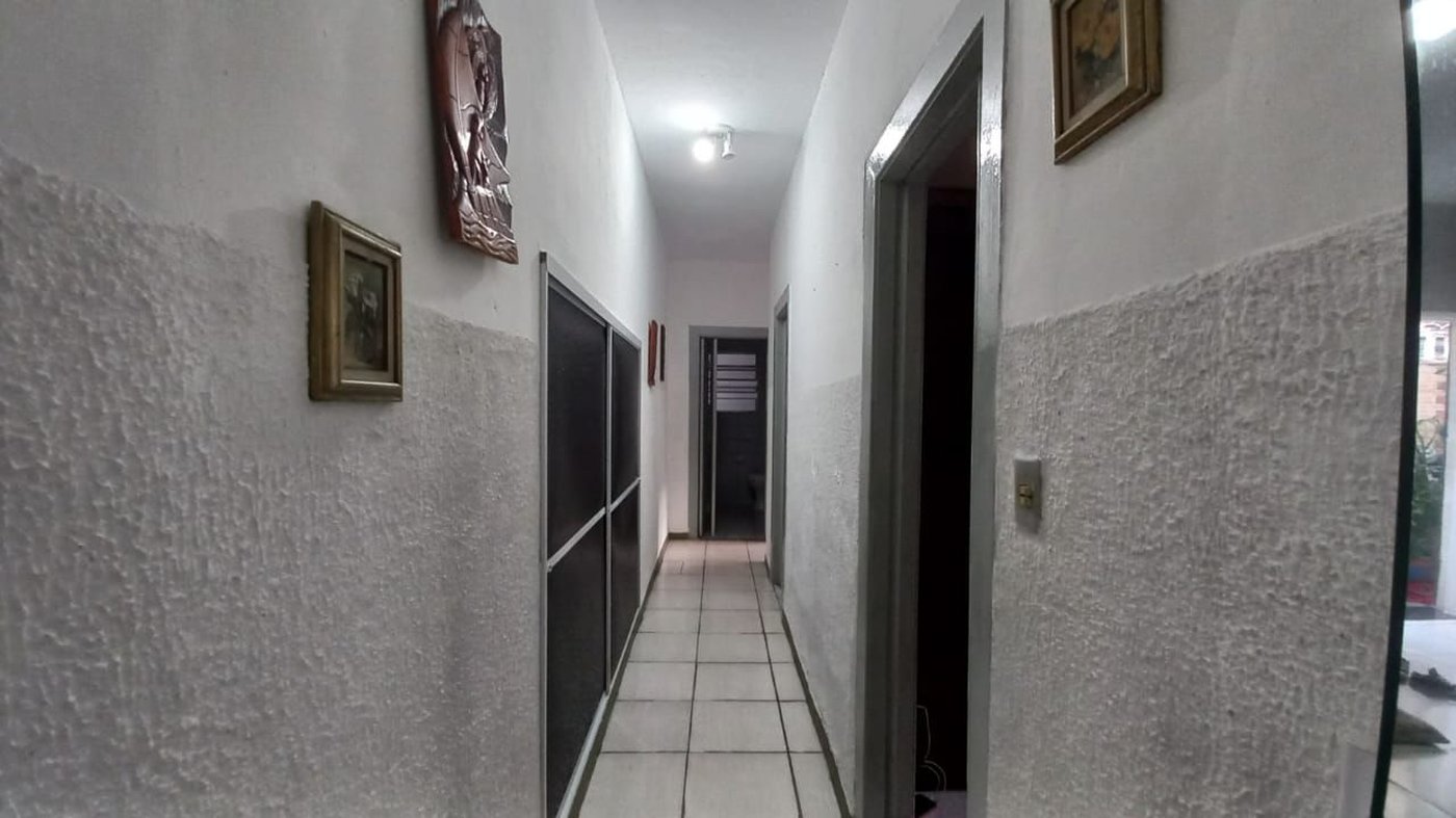 Casa com 2 dormitórios à venda, 100 m² por R$ 700.000,00 - Vila Guilhermina - Praia Grande/SP