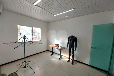 Casa residencial com ponto comercial a venda no Centro