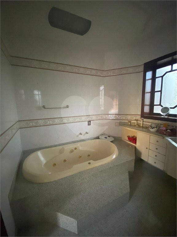 Casa à venda com 3 quartos, sendo 4 suítes,  no condomínio Estância Marambaia, Vinhedo - SP