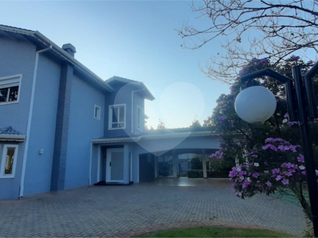 Casa à venda com 4 suítes no condomínio Suíça da Cantareira, Mairiporã - SP