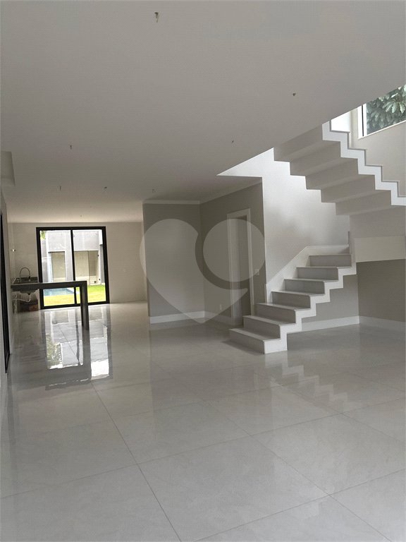 Casa à venda com 4 suítes no condomínio Riomar X, Rio de Janeiro - RJ