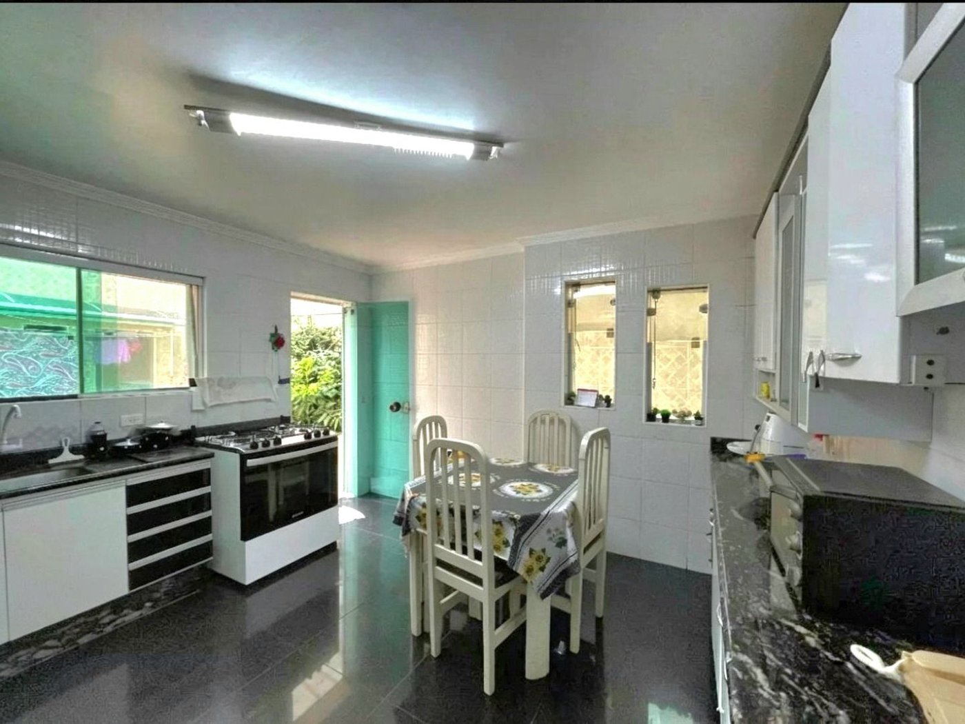 Casa com 3 dormitórios à venda, 210 m² por R$ 1.200.000,00 - Encruzilhada - Santos/SP