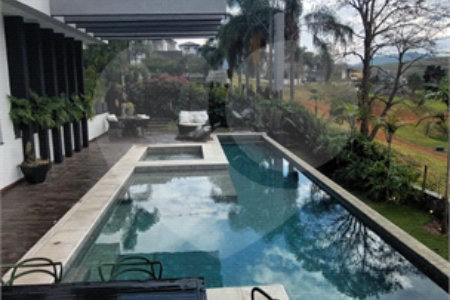Casa à venda com 3 suítes no condomínio Figueira Garden, Atibaia - SP