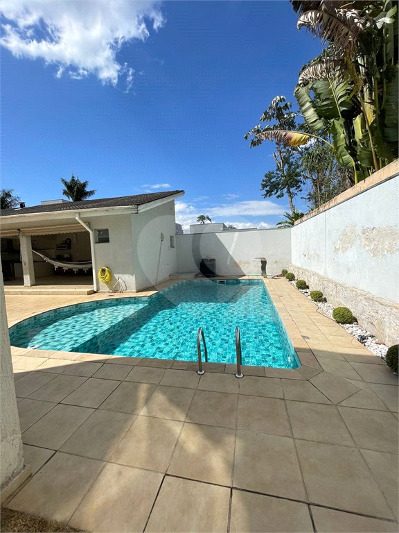 Casa à venda com 4 suítes no condomínio Aruã Lagos, Mogi das Cruzes - SP