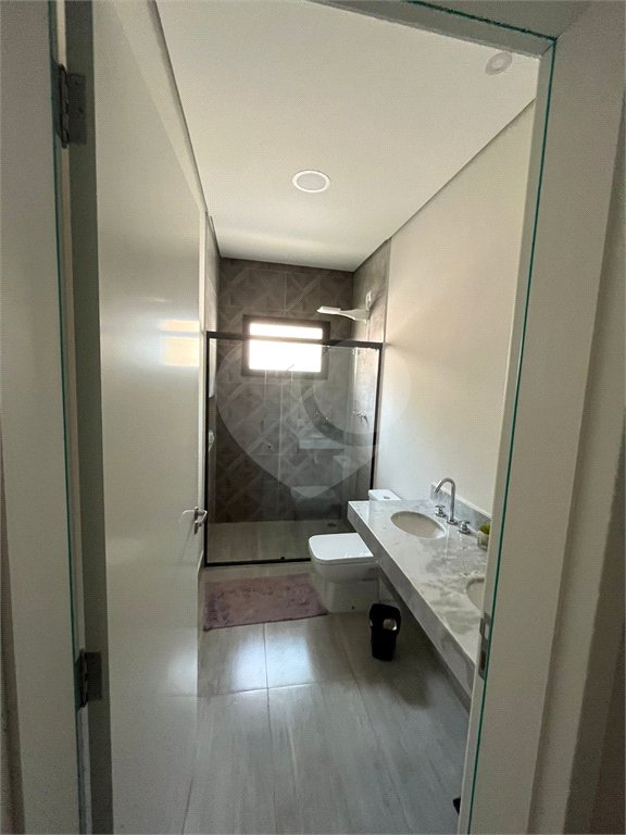 Casa à venda com 4 suítes no condomínio Figueira Garden, Atibaia - SP