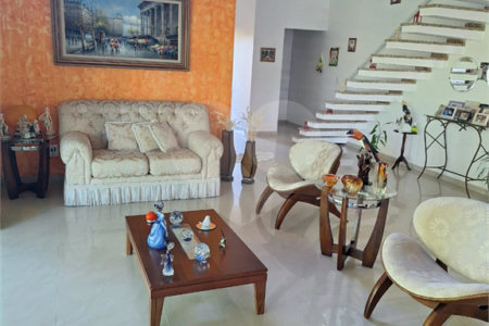 Casa à venda com 4 suítes no condomínio Bougainville, Peruíbe - SP