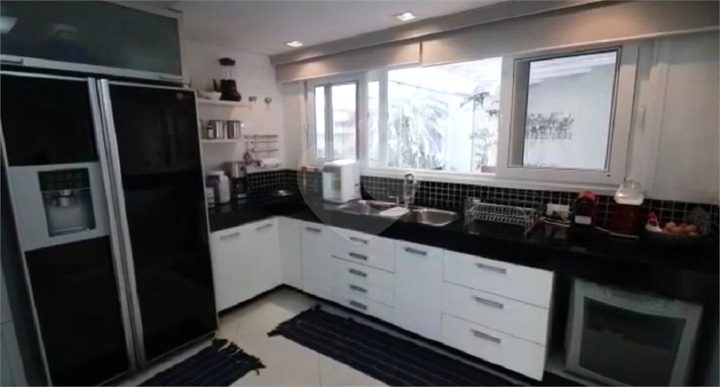 Casa à venda com 5 suítes no condomínio Parque Arco Iris, Atibaia - SP
