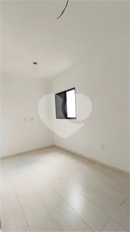 Casa à venda com 2 suítes no condomínio Residencial Paranaguá, São Paulo - SP