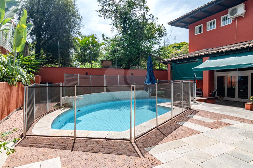 Casa à venda com 4 suítes no condomínio Residencial Chácara Monte Alegre, São Paulo - SP