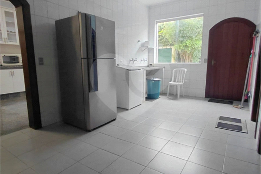 Casa à venda com 4 suítes no condomínio Ville Bourghese, São Paulo - SP