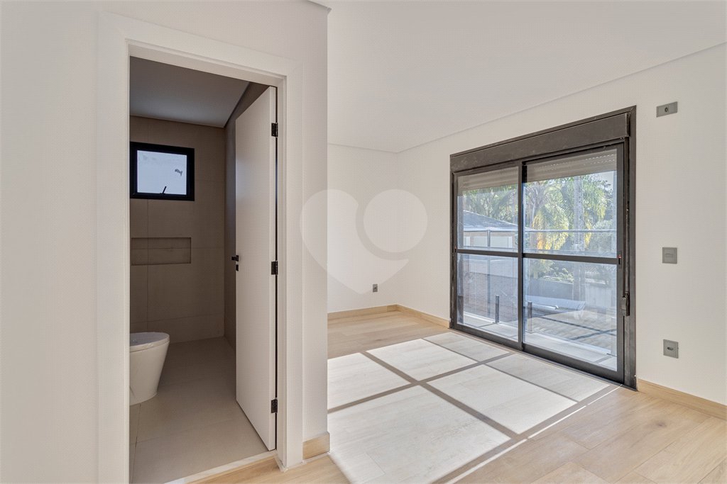 Casa à venda com 4 suítes no condomínio Villa Suiça, São Paulo - SP