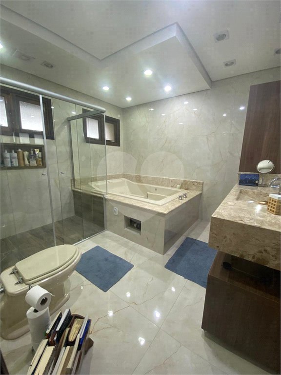 Casa à venda com 4 suítes no condomínio Vale da Santa Fé, Vinhedo - SP