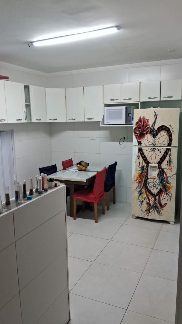 Sobrado com 3 dormitórios à venda, 150 m² por R$ 780.000,00 - Estuário - Santos/SP