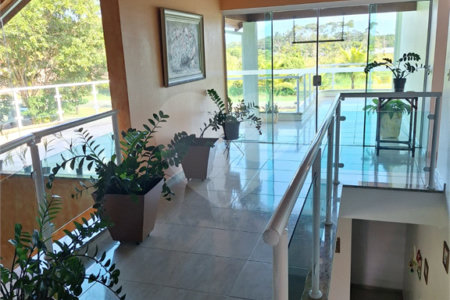 Casa à venda com 4 suítes no condomínio Bougainville, Peruíbe - SP