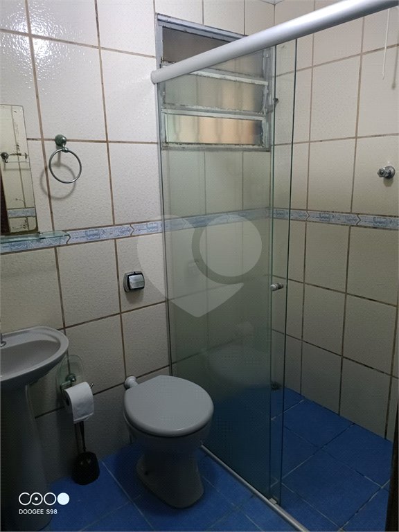 Casa à venda com 4 quartos, sendo 1 suíte,  no condomínio Morada da Praia, Bertioga - SP