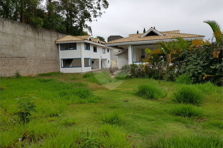 Casa à venda com 4 suítes no condomínio Suíça da Cantareira, Mairiporã - SP