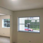 Casa com 3 dormitórios à venda, 116 m² por R$ 690.000,00 - Gonzaga - Santos/SP