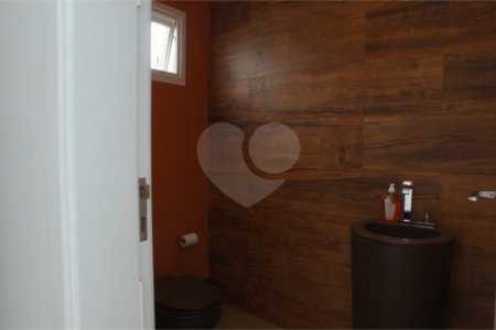 Casa à venda com 4 suítes no condomínio Figueira Gardn, Atibaia - SP
