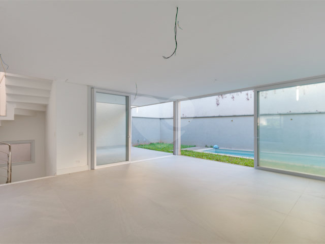 Casa à venda com 4 suítes no condomínio Vila Arese, São Paulo - SP