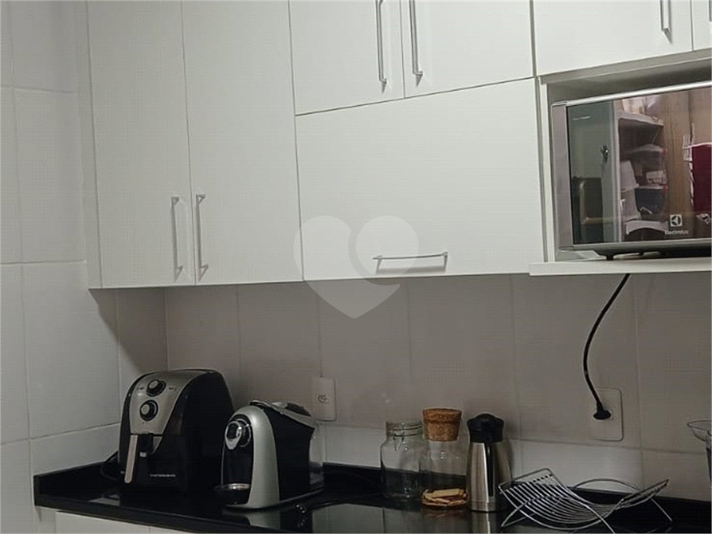Casa à venda com 2 suítes no condomínio Residencial Pavoni I, São Paulo - SP