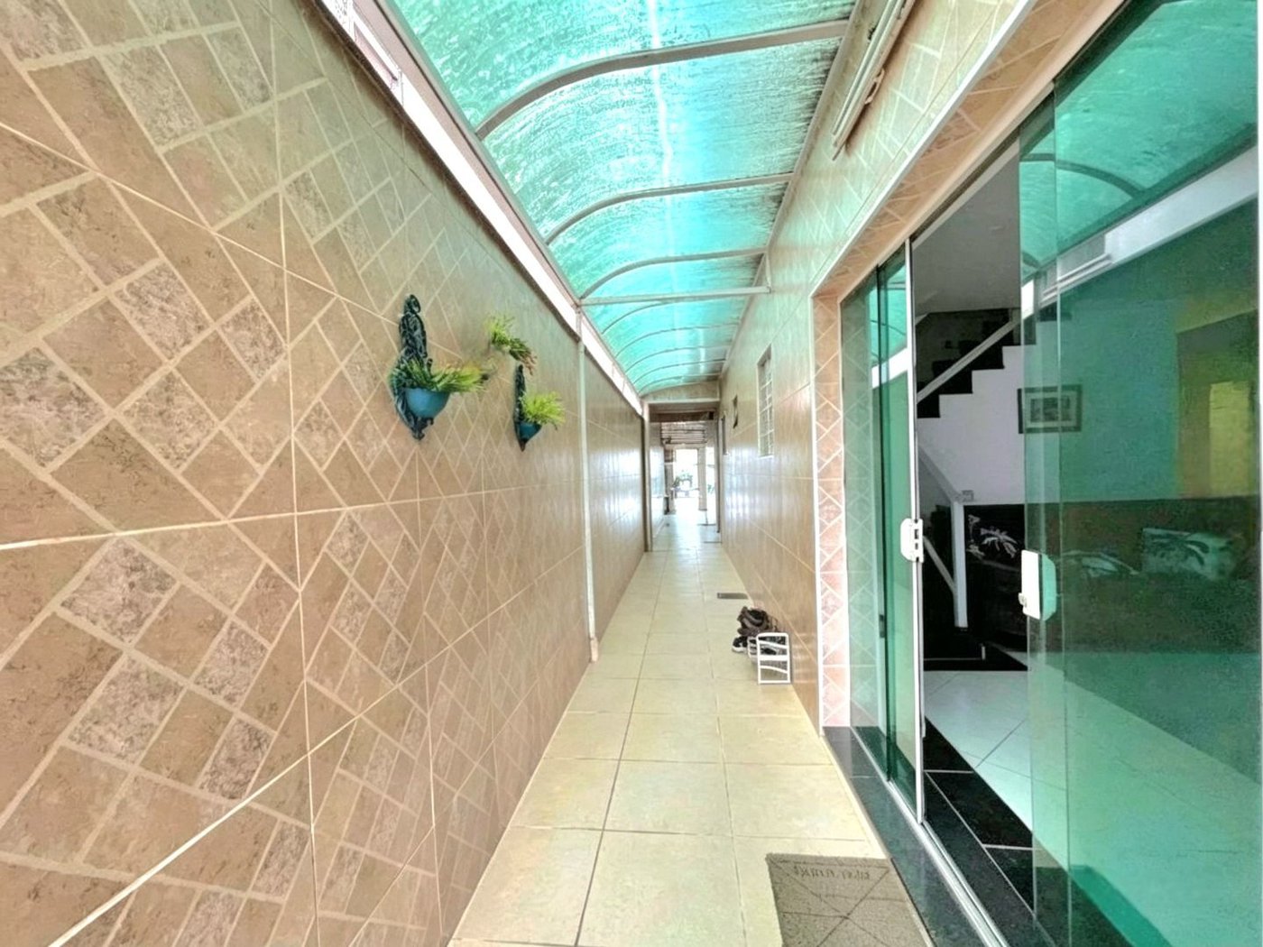 Casa com 3 dormitórios à venda, 210 m² por R$ 1.200.000,00 - Encruzilhada - Santos/SP