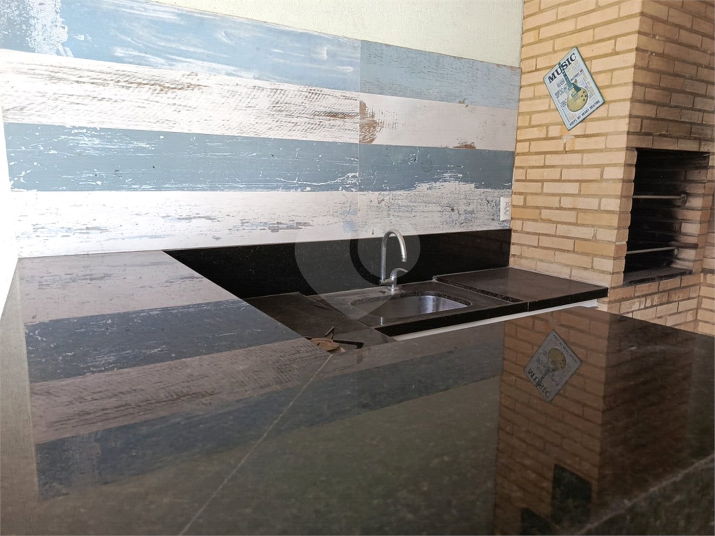 Casa à venda com 4 quartos, sendo 1 suíte, no condomínio Atlantico Sul, Rio de Janeiro - RJ