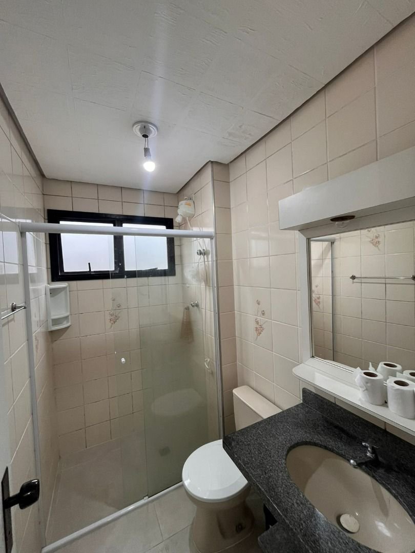 Apartamento com 2 dormitórios à venda, 65 m² por R$ 360.000,00 - Vila Júlia - Guarujá/SP