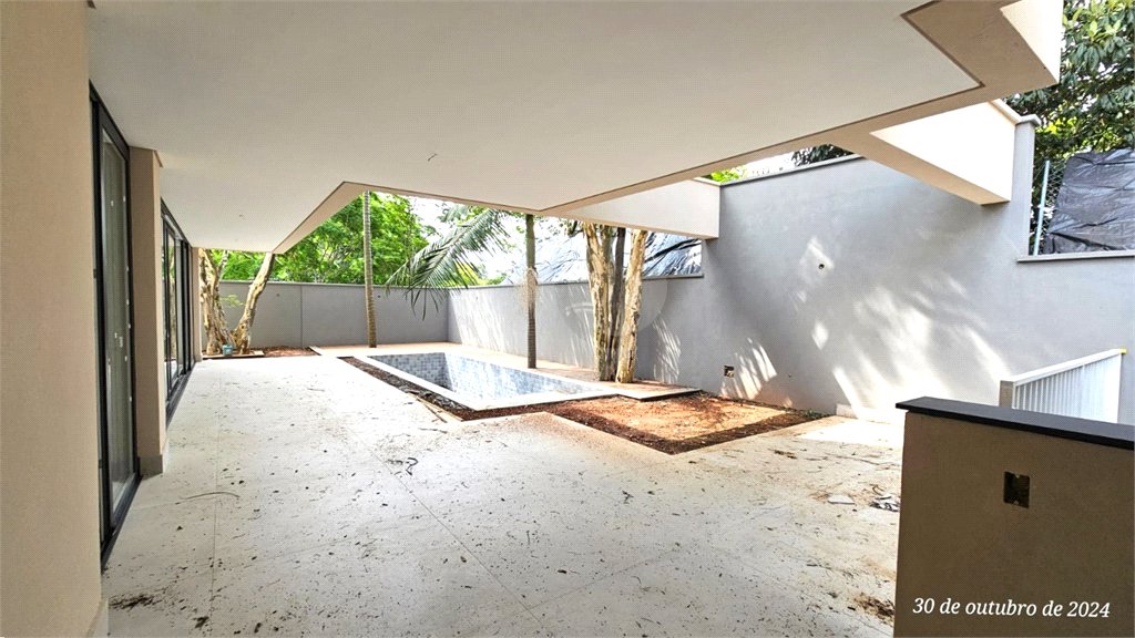 Casa à venda com 4 suítes no condomínio Garda, São Paulo - SP