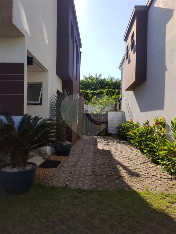 Casa à venda ou para alugar com 4 suítes no condomínio Sambaqui, São Sebastião - SP