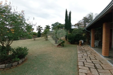 Casa à venda com 4 suítes no condomínio Estância Marambaia, Vinhedo - SP