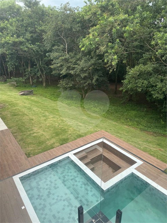 Casa à venda com 4 suítes no condomínio Figueira Garden, Atibaia - SP