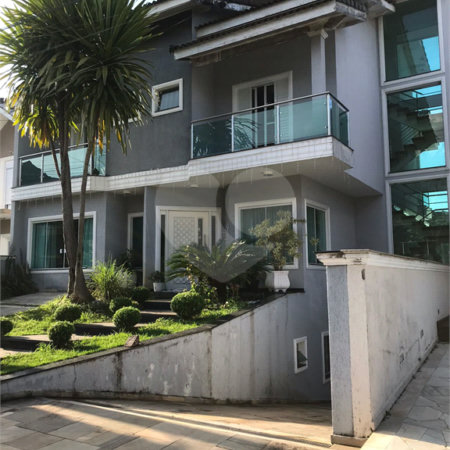Casa à venda com 4 suítes no condomínio Aruã, Mogi das Cruzes - SP