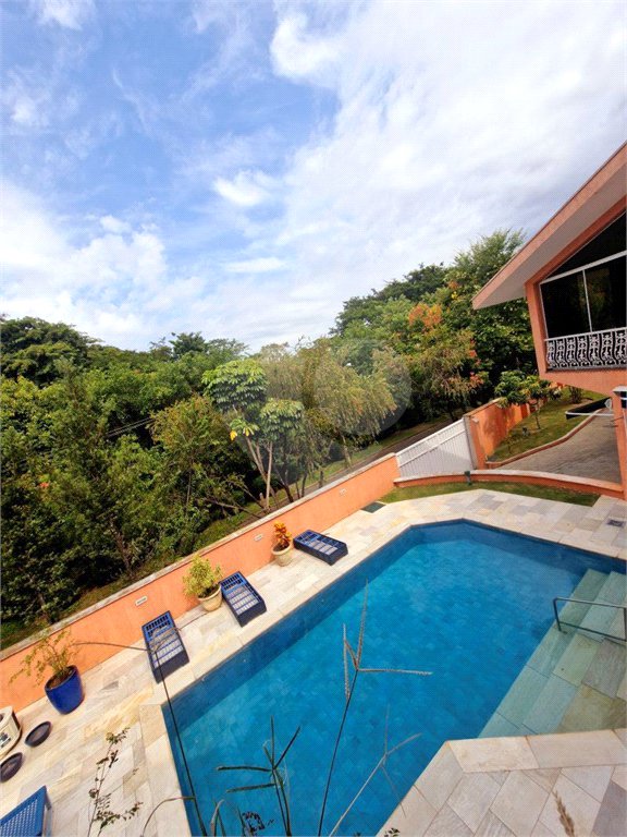 Casa à venda com 4 suítes no condomínio Estância Marambaia, Vinhedo - SP