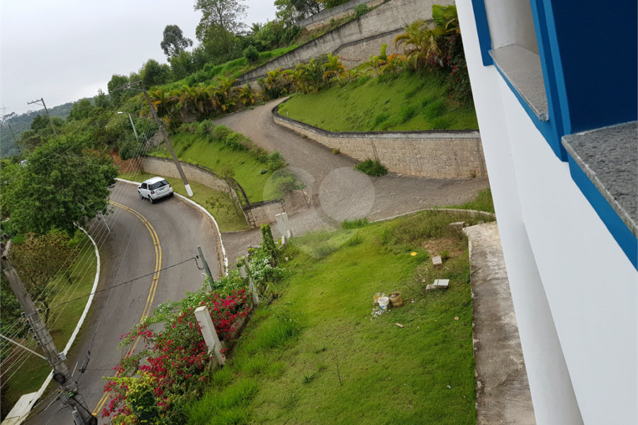 Casa à venda com 4 suítes no condomínio Suíça da Cantareira, Mairiporã - SP