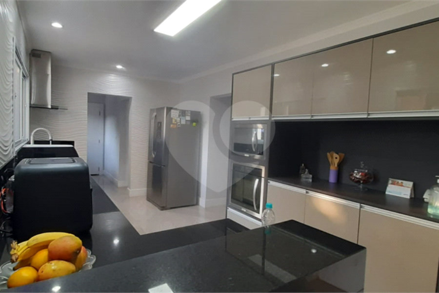 Casa à venda com 4 suítes no condomínio Suíça da Cantareira, Mairiporã - SP