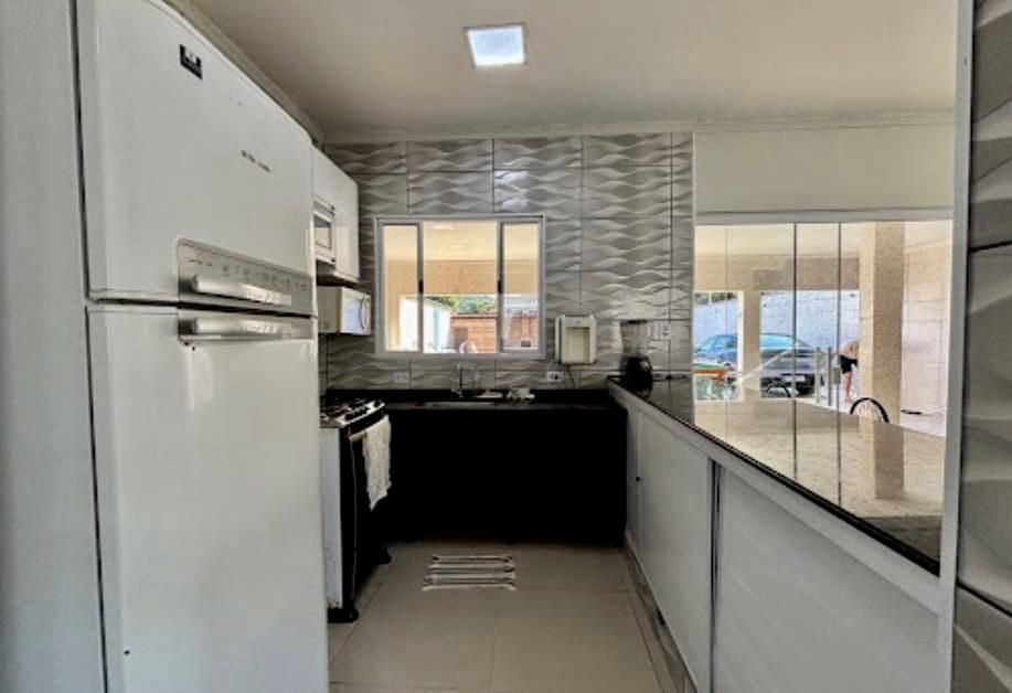 Sobrado à venda, 270 m² por R$ 1.010.000,00 - Balneário Praia do Pernambuco - Guarujá/SP