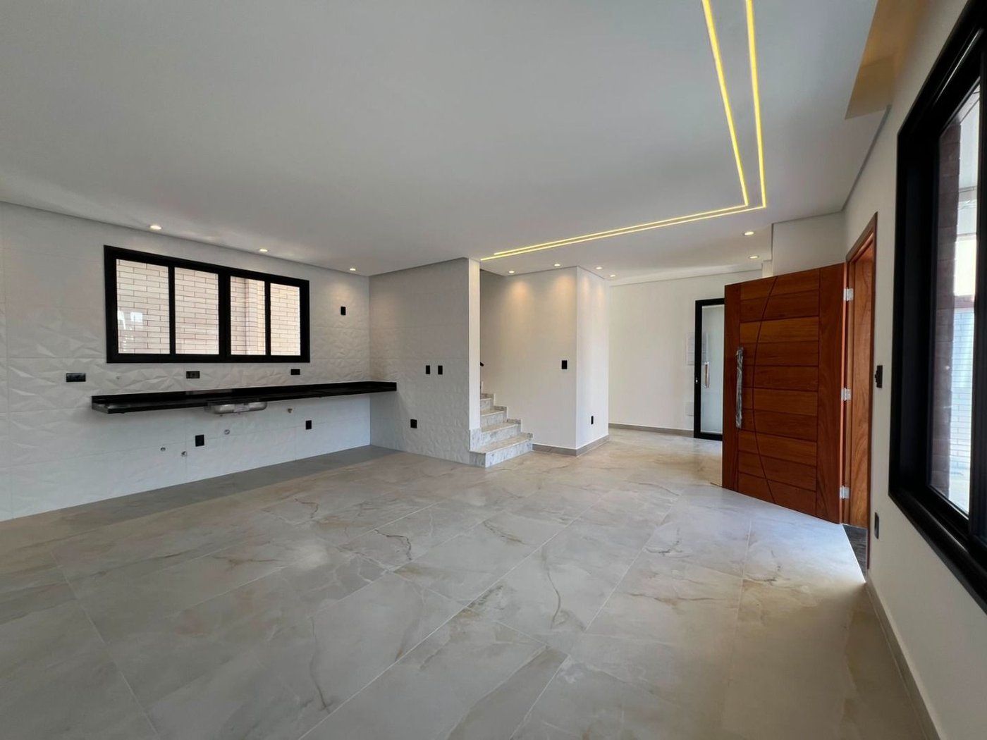 Sobrado com 4 dormitórios à venda, 234 m² por R$ 2.500.000,00 - Ponta da Praia - Santos/SP