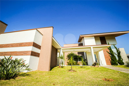 Casa à venda com 4 quartos, sendo 2 suítes, no condomínio Residencial Jardim Primavera, Louveira - SP