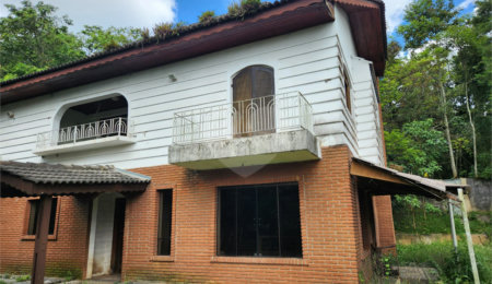Casa à venda com 4 suítes no condomínio Alpes da Cantareira, Mairiporã - SP