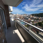 Apartamento com 2 dormitórios à venda, 58 m² por R$ 478.000,00 - Centro - São Vicente/SP