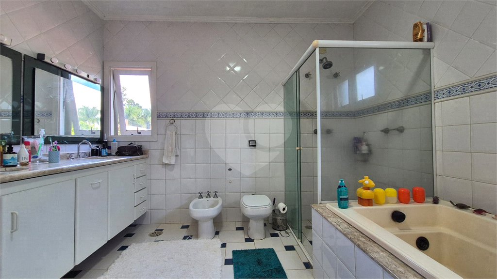 Casa à venda com 4 suítes no condomínio Vivenda do Lago, Sorocaba - SP